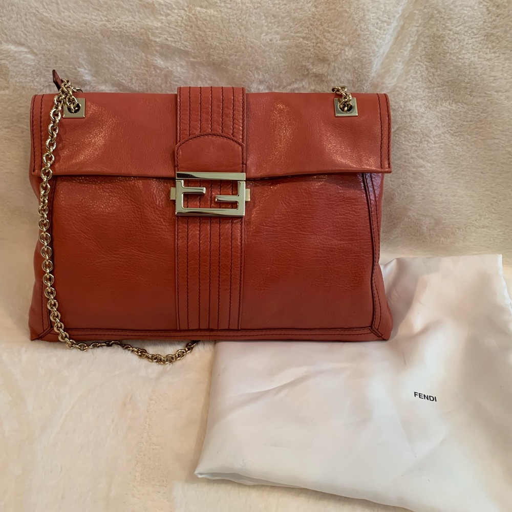 Medium Sized Orange Fendi Bag with Gold Accents
